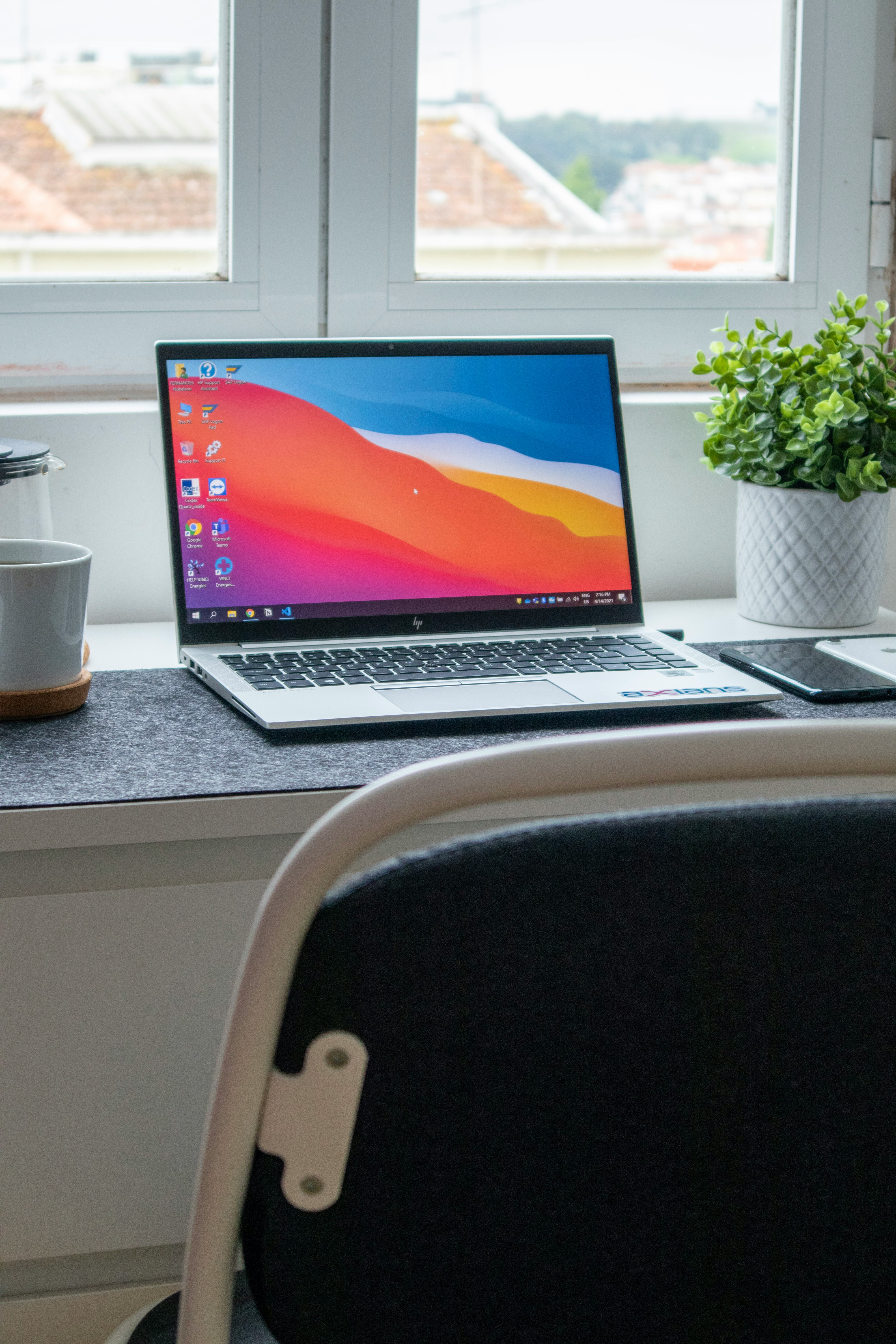 macbook pro on white table